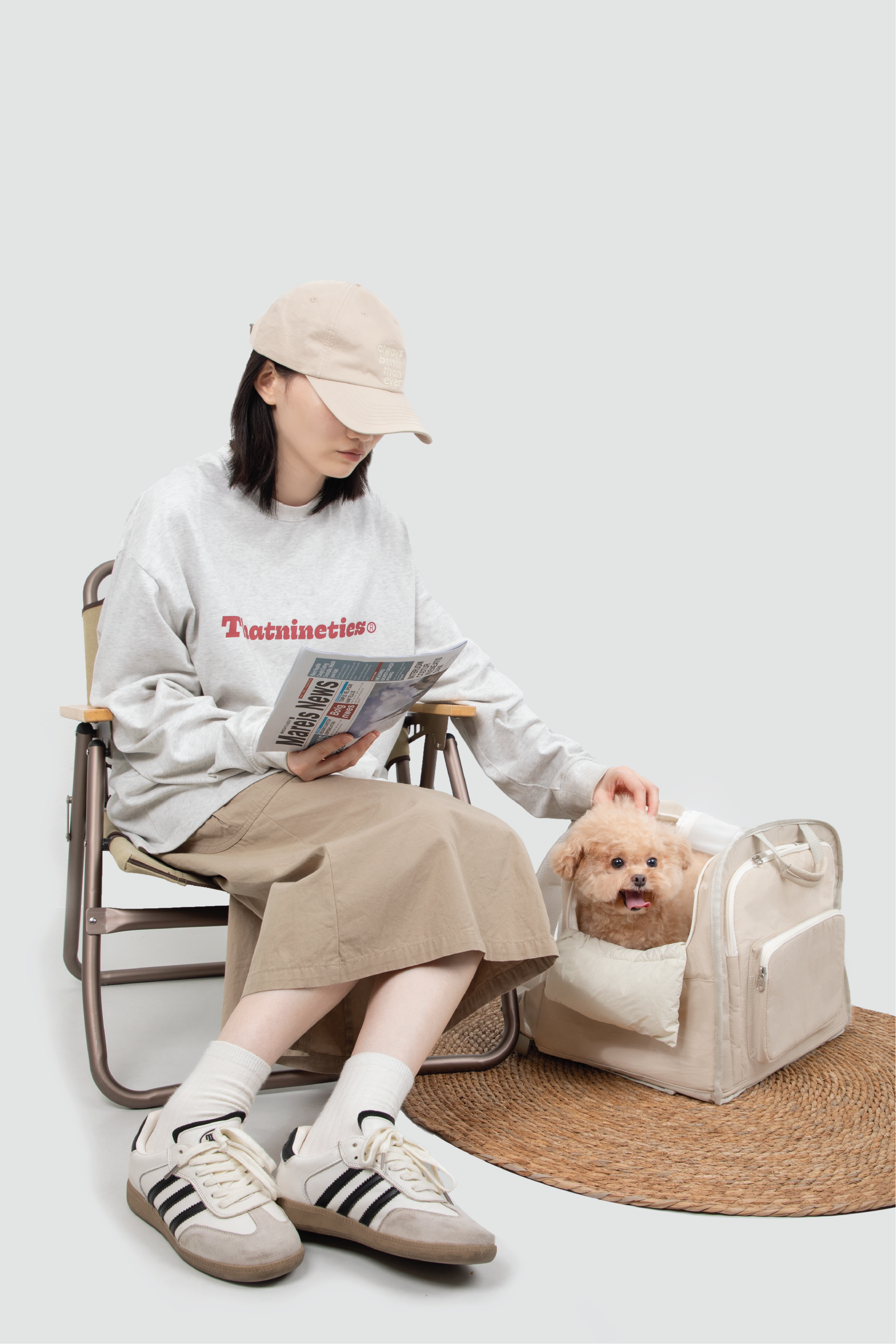 Shop Pawsitivity's Winter Pet Carrier, this pet carrier can be carried by hand or worn as a backpack. The luggage strap on the back makes it a breeze to attach to your suitcase for seamless travel. The front and roll-up side windows ensure interaction and airflow, keeping your pets safe and comfortable. Pet Carriers Now On Sale. Order Yours Today for the Best Price!