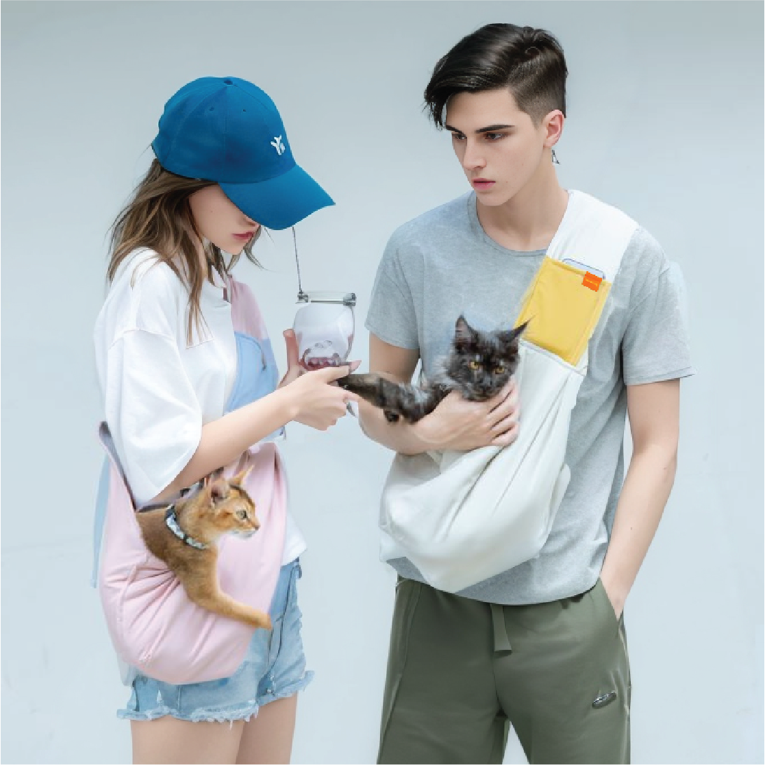 A premium sling bag dog and cat carrier for your furry companion. Convenient and stylish, perfect for on-the-go adventures. Colored in light pink with 100% cotton material, from Pawsitivity (Toronto Premium Pet Shop).