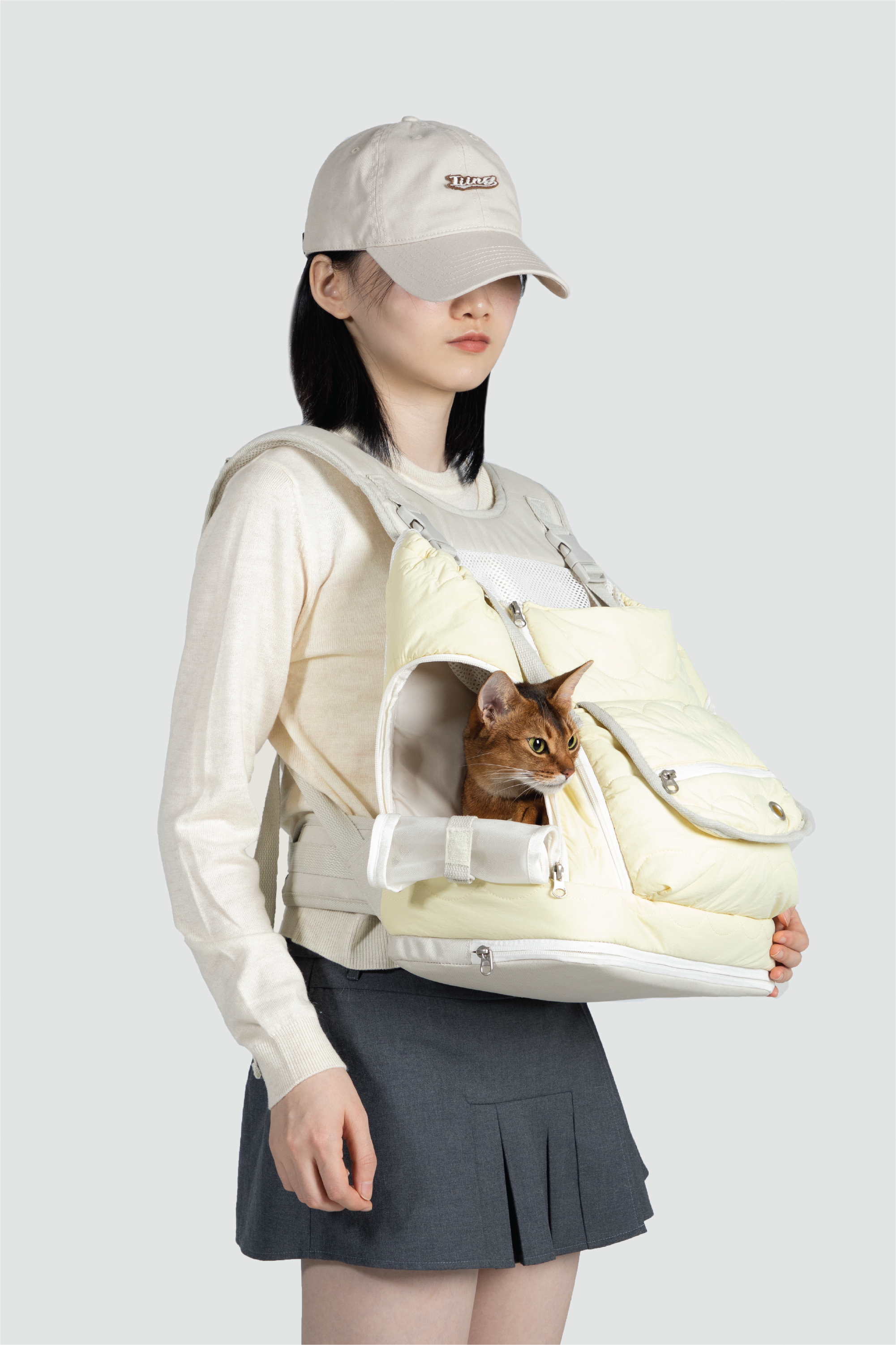 Shop Pawsitivity's Winter Pet Carrier, this backpack pet carrier is packed with practical features, including a spacious front pocket, the roll-up mesh side openings. Plus, the built-in safety leash and waterproof nylon material provide peace of mind, keeping your pet secure and dry wherever you go. Shop the Pet Carrier ON SALE!