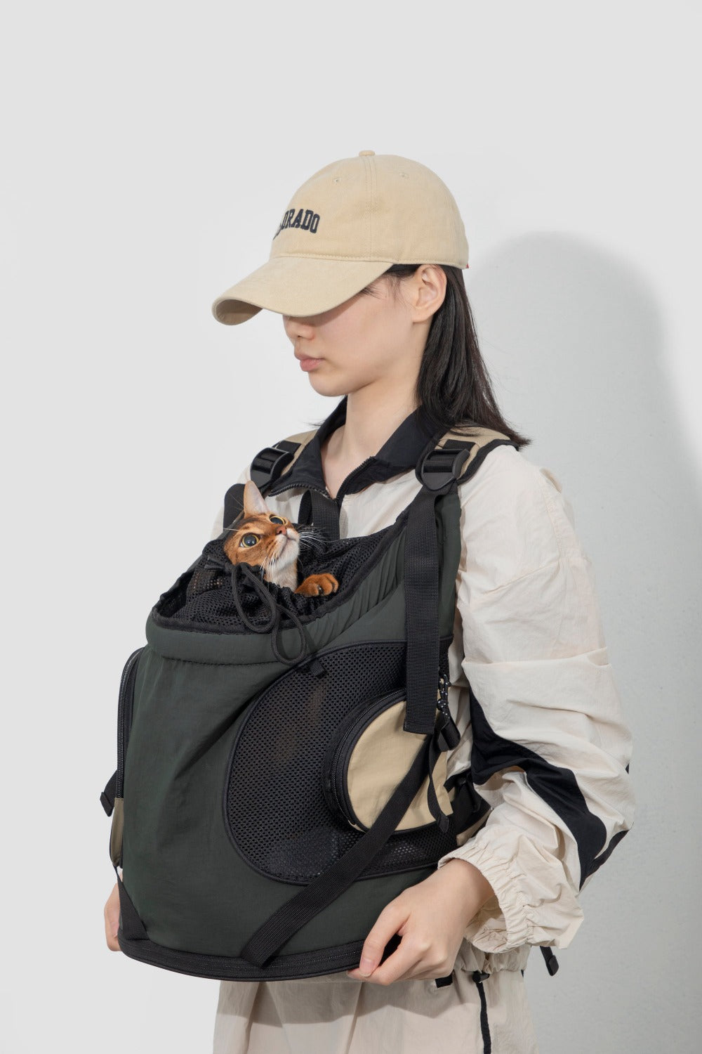 Pawsitivity's Front Chest Pet Carrier: Luxury Support Pet Backpack, features double shoulder straps, a waist strap for stability, and an X-shaped cross for unbeatable support. The ergonomic design ensures a joyful outing for both you and your pet.