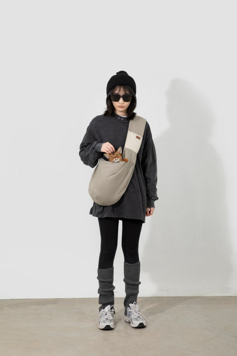 Explore the outdoors with your pet in Pawsitivity's portable all-season sling bag pet carrier! Enjoying every adventure with your cats & dogs. Convenient and stylish, perfect for on-the-go adventures. Colored in light grey with 100% cotton material, Order yours Today Now!