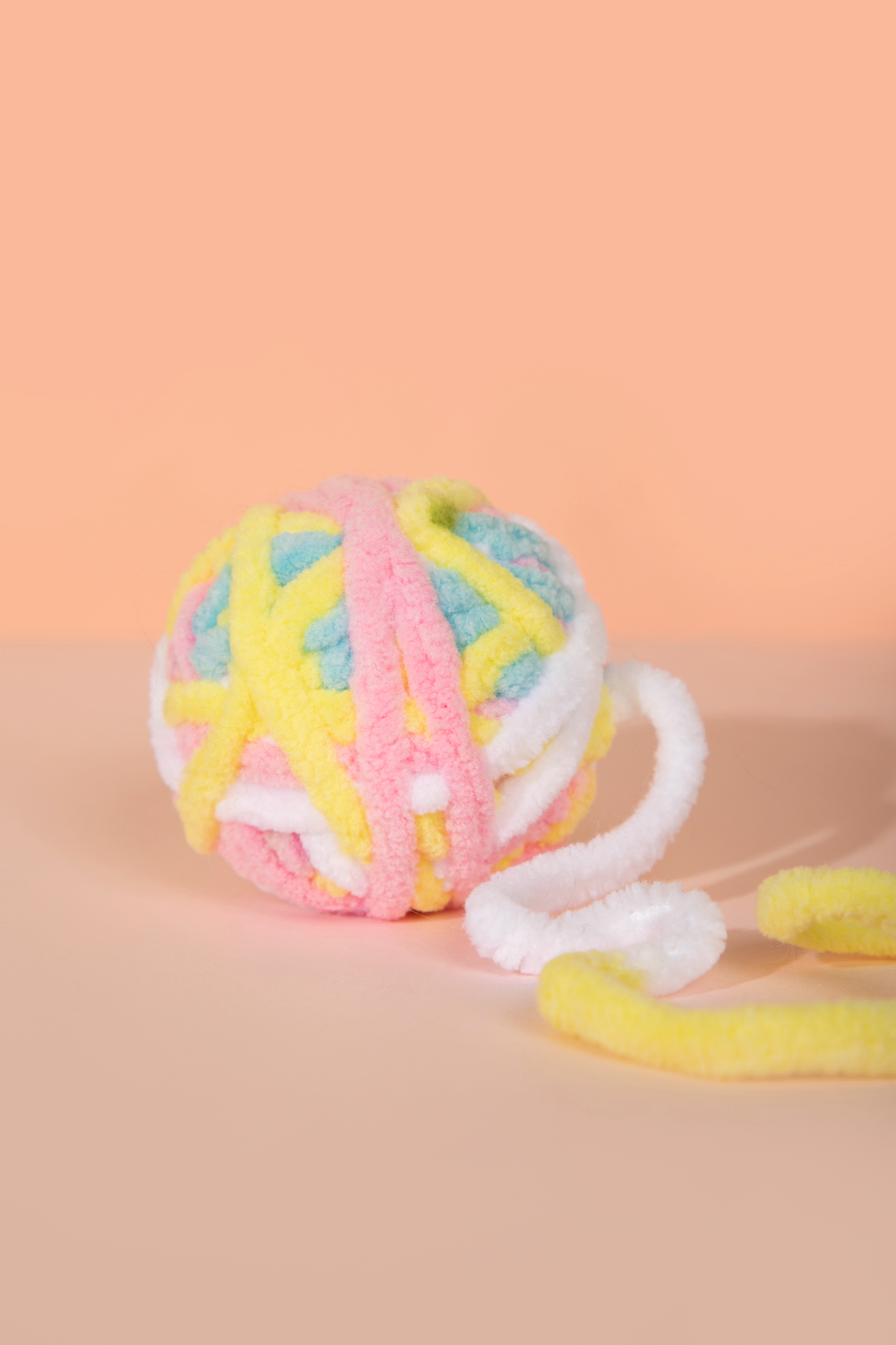 Pawsitivity's Engaging Yarnado Cat Toy - Colorful Ball of Yarn with Playful Bell, Promotes Exercise, Encourages Active Play, Perfect for Chasing and Swatting. Shop Now!