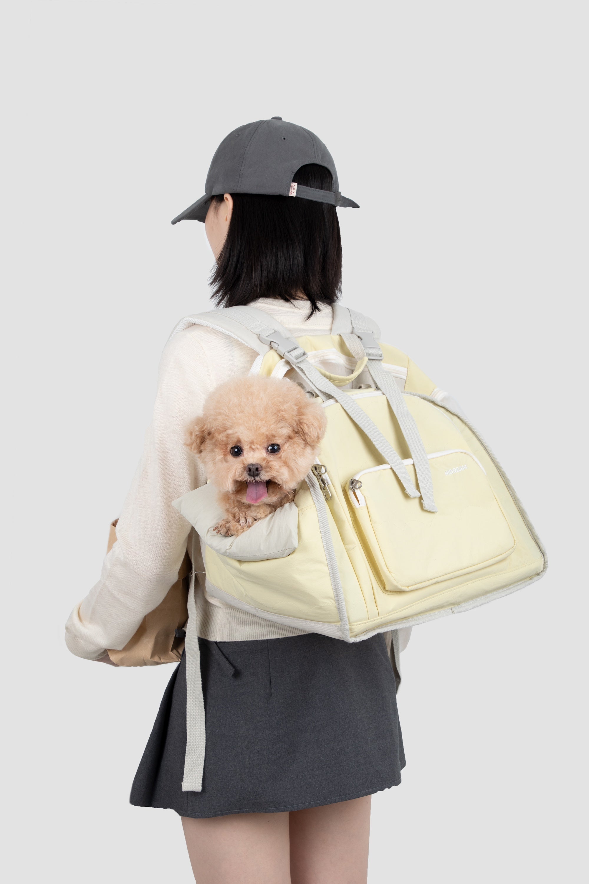 Shop Pawsitivity's Winter Pet Carrier, this pet carrier can be carried by hand or worn as a backpack. The luggage strap on the back makes it a breeze to attach to your suitcase for seamless travel. Made from waterproof nylon fabric to keep your pet dry and comfortable, even on rainy days. Shop Now for the Best Price!