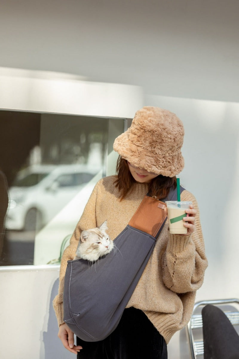 Explore the outdoors with your pet in Pawsitivity's portable all-season sling bag pet carrier! Enjoying every adventure with your cats & dogs. Convenient and stylish, perfect for on-the-go adventures. Colored in ash grey with 100% cotton material, Order yours Today Now!