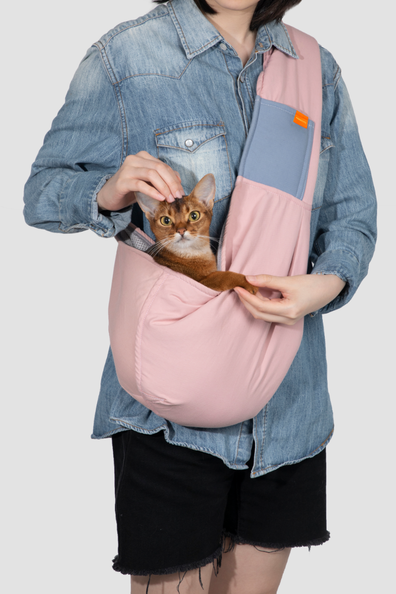 Explore the outdoors with your pet in Pawsitivity's portable all-season sling bag pet carrier! Enjoying every adventure with your cats & dogs. Convenient and stylish, perfect for on-the-go adventures. Colored in dusty pink with 100% cotton material, Order yours Today Now!