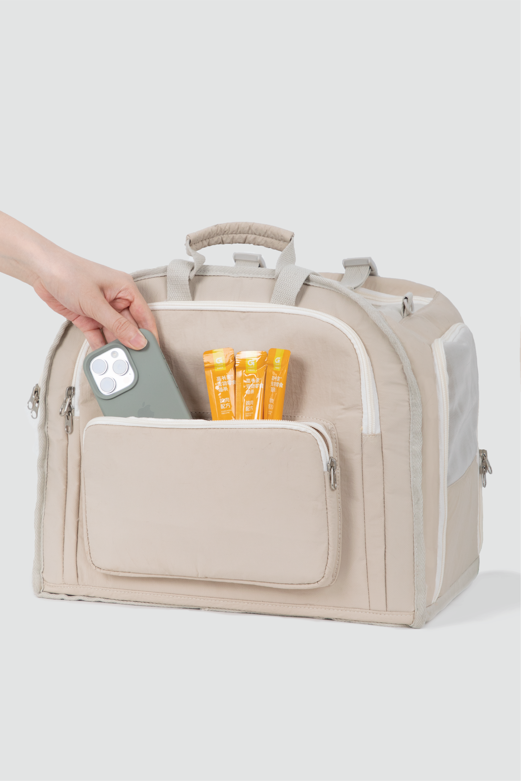 Shop Pawsitivity's Winter Pet Carrier, this pet carrier can be carried by hand or worn as a backpack. The luggage strap on the back makes it a breeze to attach to your suitcase for seamless travel. The front and roll-up side windows ensure interaction and airflow, keeping your pets safe and comfortable. Pet Carriers Now On Sale. Order Yours Today for the Best Price!