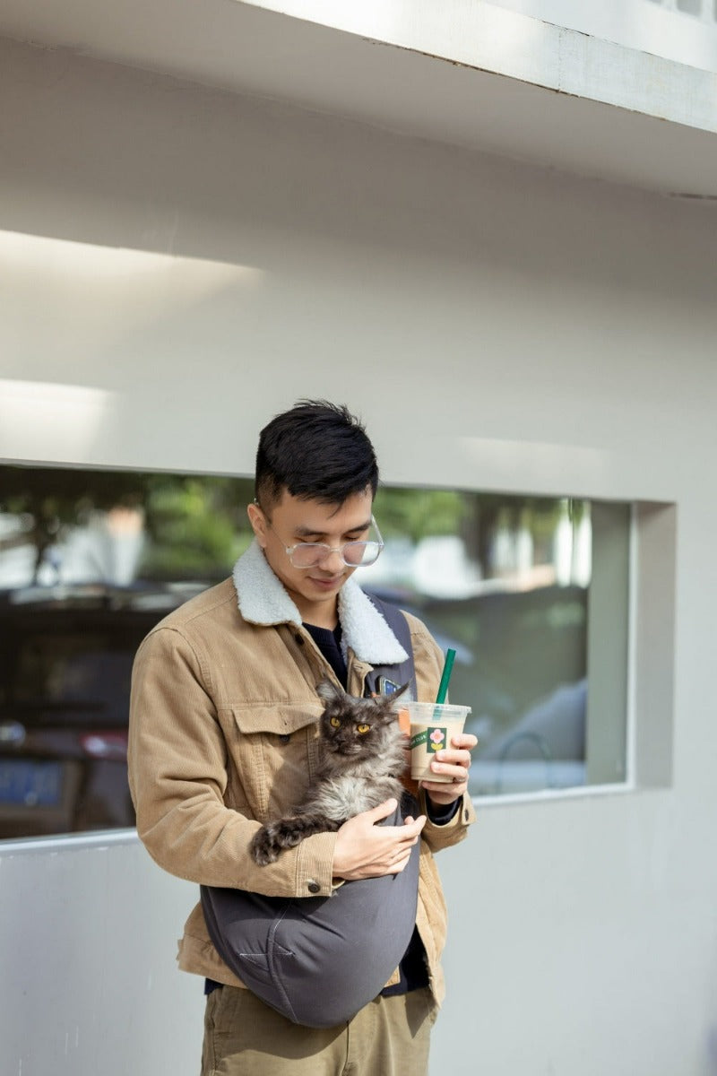 Explore the outdoors with your pet in Pawsitivity's portable all-season sling bag pet carrier! Enjoying every adventure with your cats & dogs. Convenient and stylish, perfect for on-the-go adventures. Colored in ash grey with 100% cotton material, Order yours Today Now!